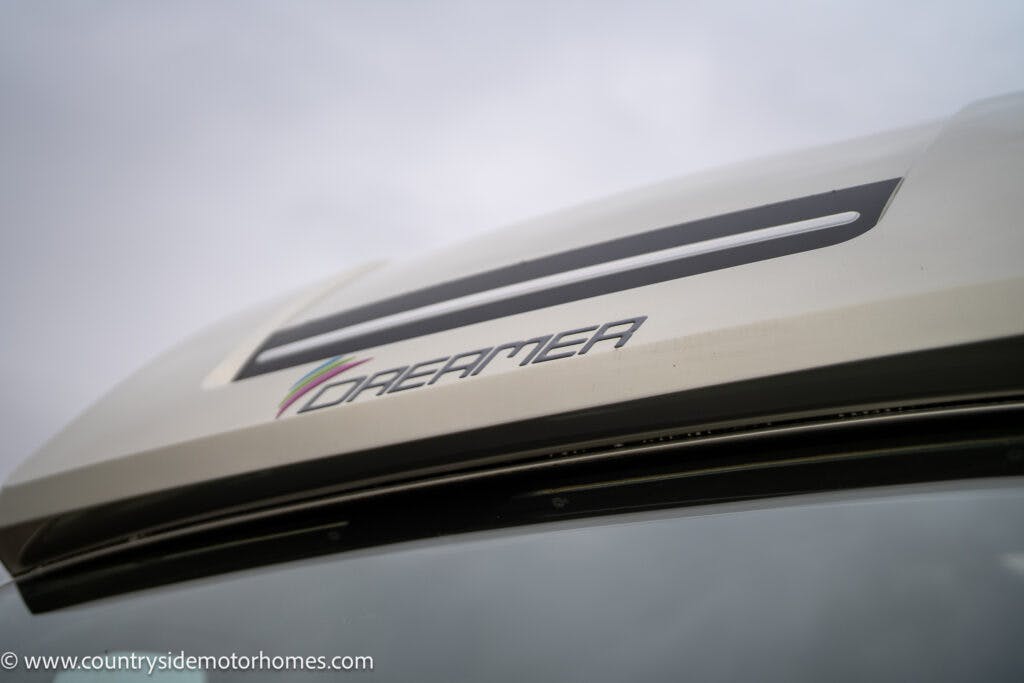 Close-up view of the front roof section of a 2020 Rapido Dreamer Select Campervan XL. The image shows part of the vehicle's top with the sky in the background. The website "www.countrysidemotorhomes.com" is visible in the bottom left corner.